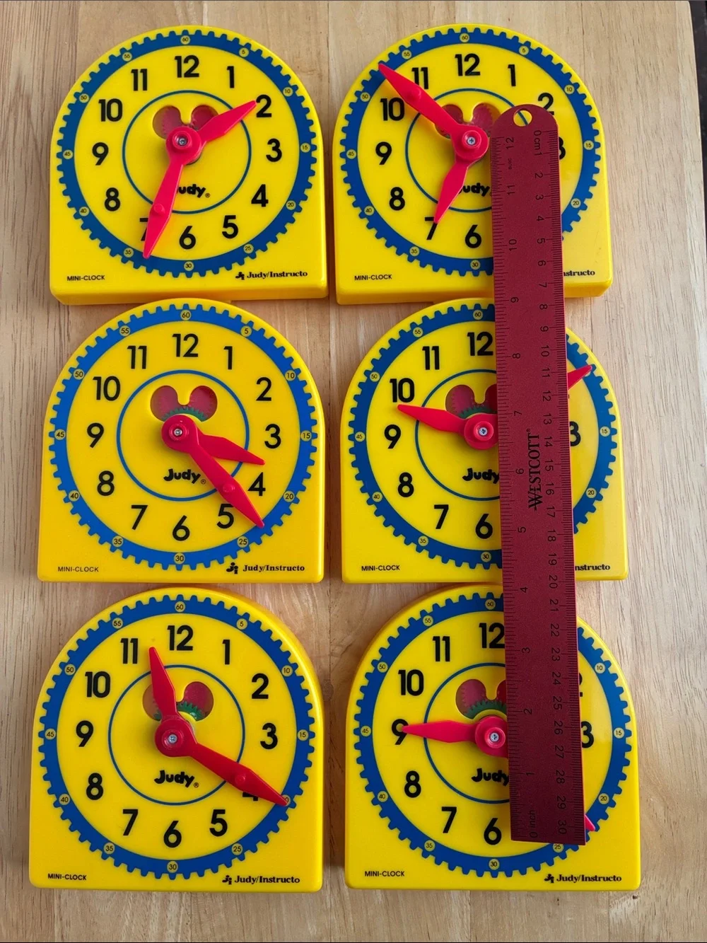 Kids Learning Clocks lot of 6 Yellow w/  Red Hands Judy/Instructo about 5 in tal